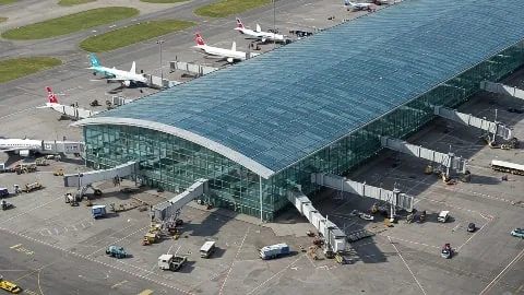 Luton Airport terminal with wheelchair accessible facilities cafes restaurants and Duty-Free shops
